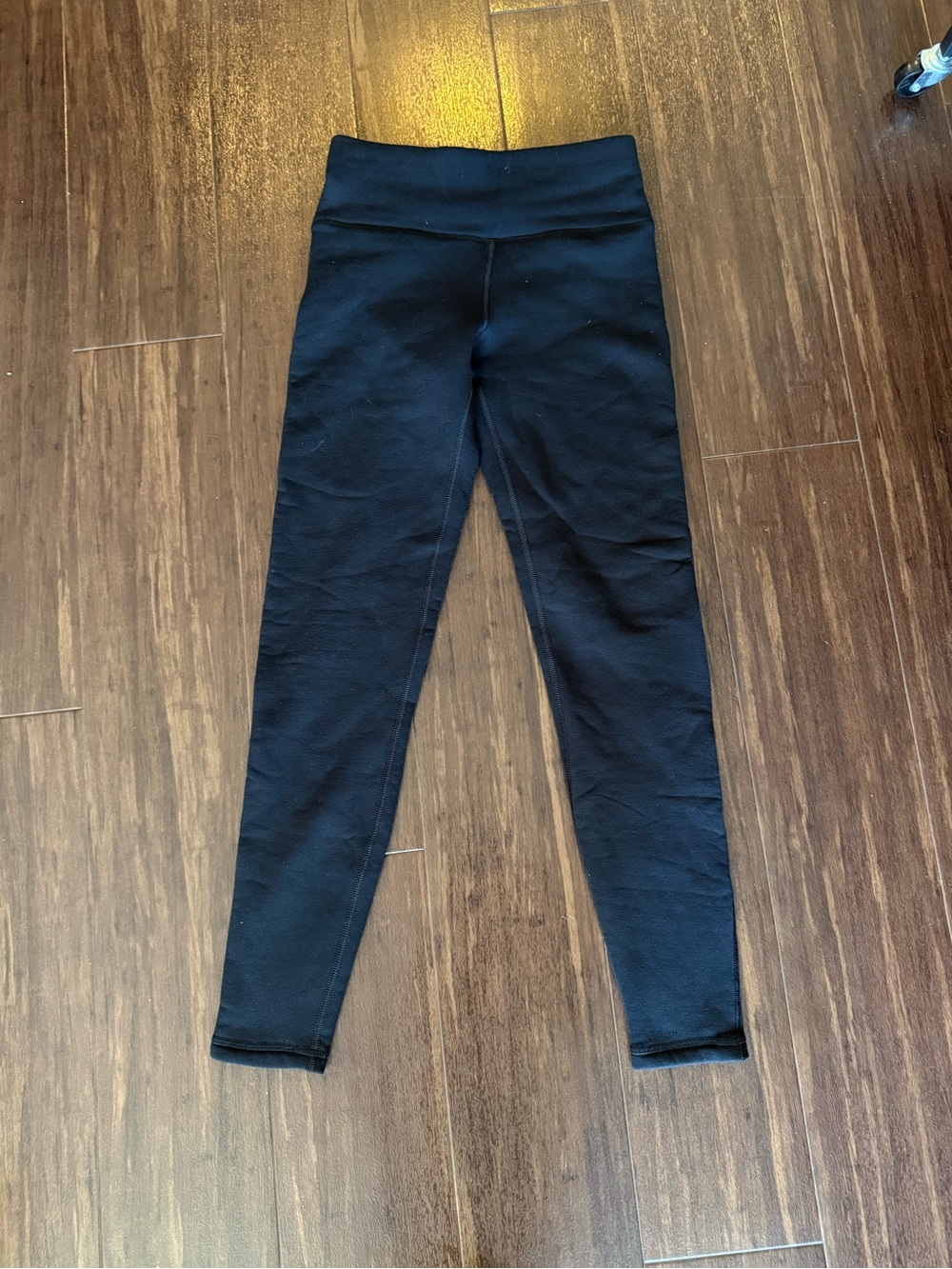 Athleta Altitude Fleece Leggings in black in size XS